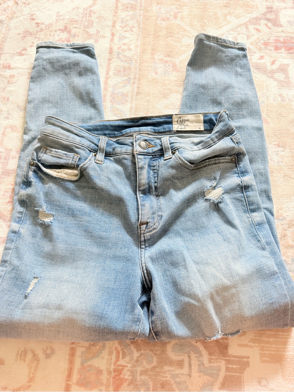 Light Wash Skinny Jeans with Distressed Detail